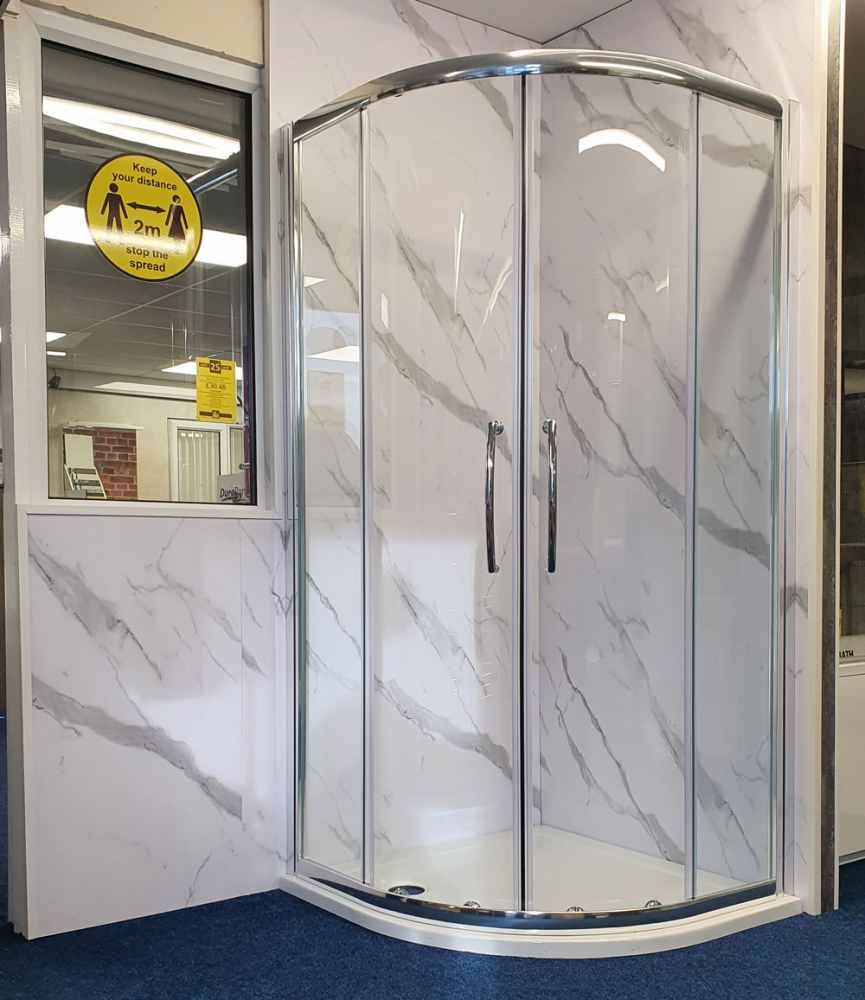 Carrara Marble Matt shower panel on display in shower cubicle