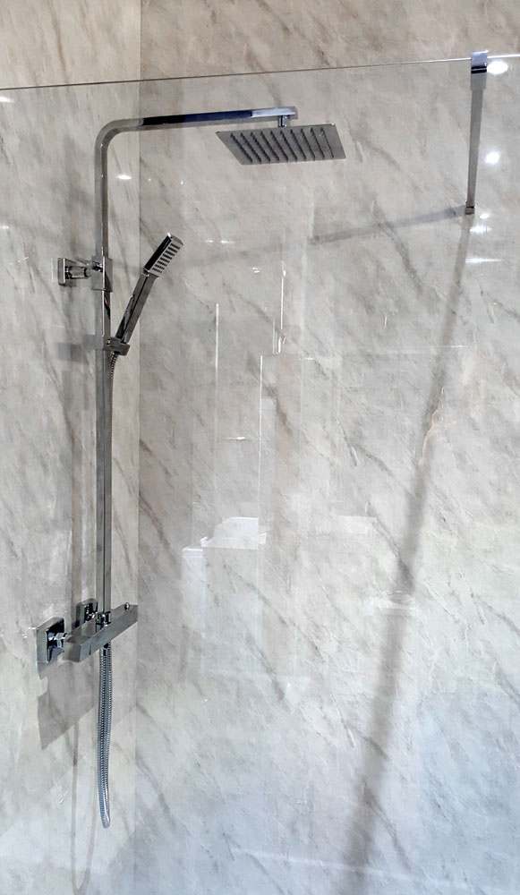Grey Marble shower panel installed in a shower area